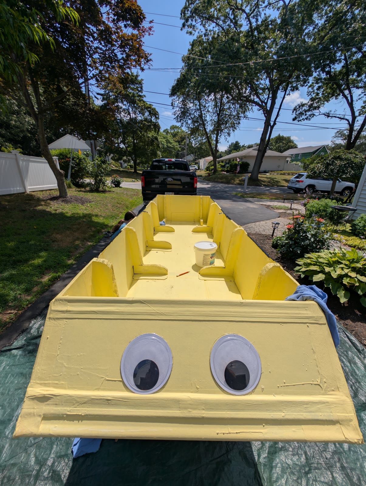 The yellow cardboard hull of The BumbleMcBees during final preparation