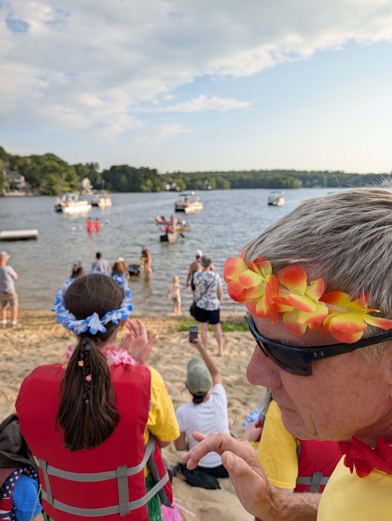 Captain Dan and crew watching the cardboard boat race from shore